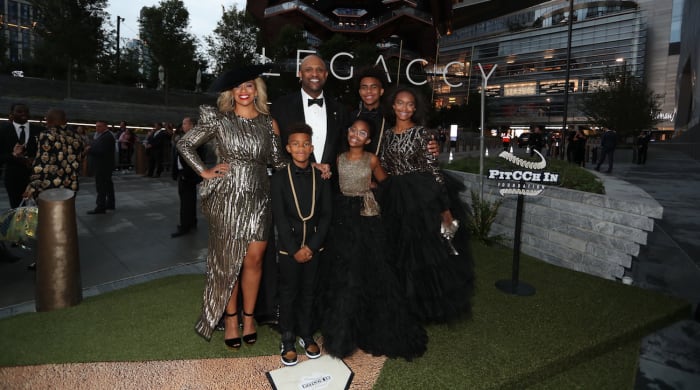 Sabathia and his wife, Amber (far left), celebrated his career and his foundation with friends and kids (counterclockwise from left) Carter, Cyia, Jaden, and Lil C.